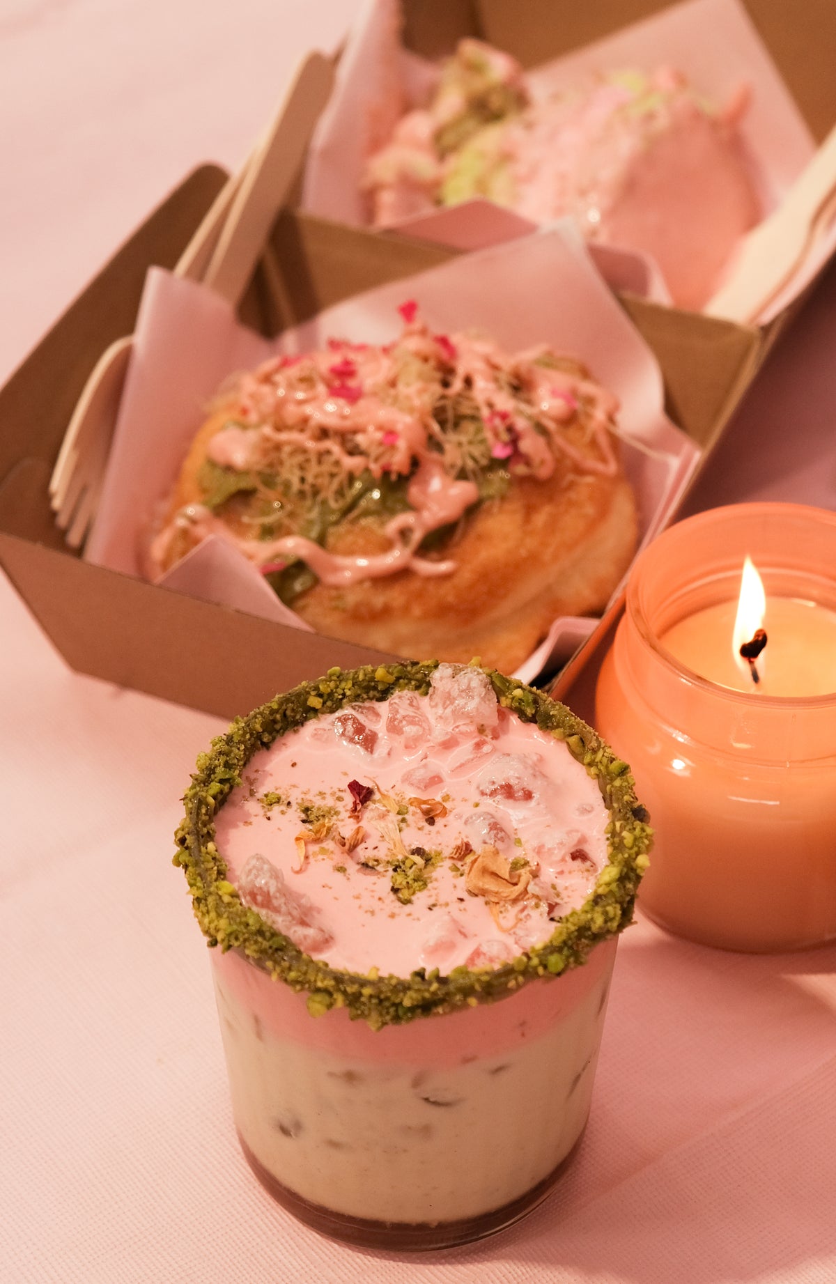 pinkstachio_bombolone_and_matcha with candle