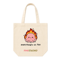 Tote bag with a cartoon character on fire and 'Pinkstachio' branding.