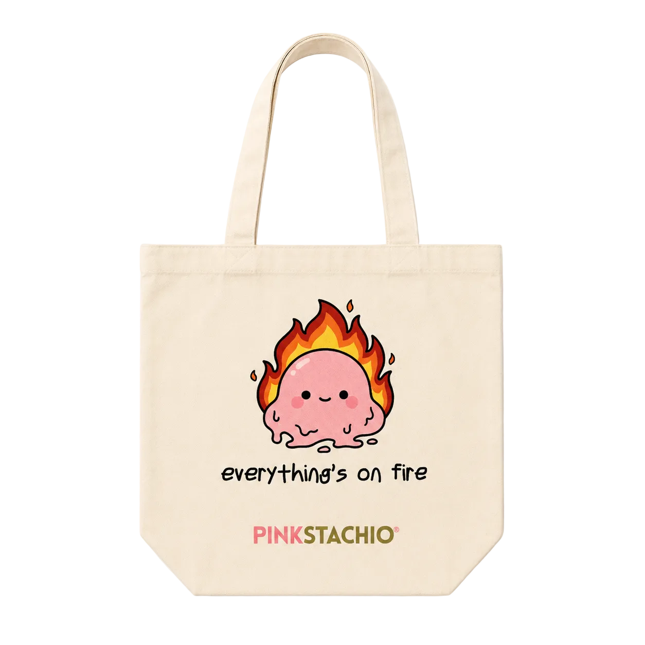Tote bag with a cartoon character on fire and 'Pinkstachio' branding.